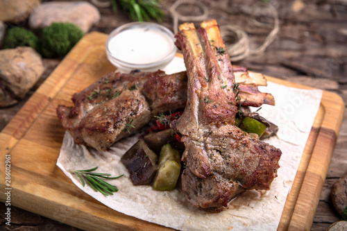 Rack of lamb. Ribs. Delicious juicy steak beef or pork. A big piece of grilled meat