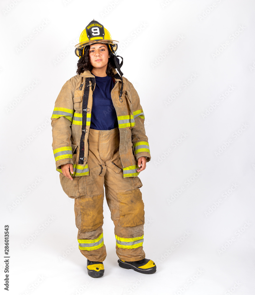 Female American firefighter in her gear Female American firefighter in her gear
