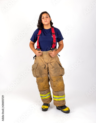 Female American firefighter in her gear photo