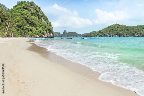 landscape view at Wua Ta Lap island beach during white soft wave splashing on the beach at Angthong Islands National Marine Park Surat Thani, Thailand  background summer © Soonthorn