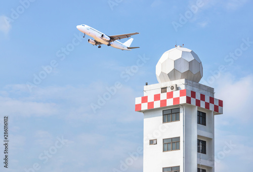 Aeronautical meteorological observations station tower or weather observations radar dome station tower for helps aircraft take off and land safety transportation in airport during passenger airplane  © Soonthorn