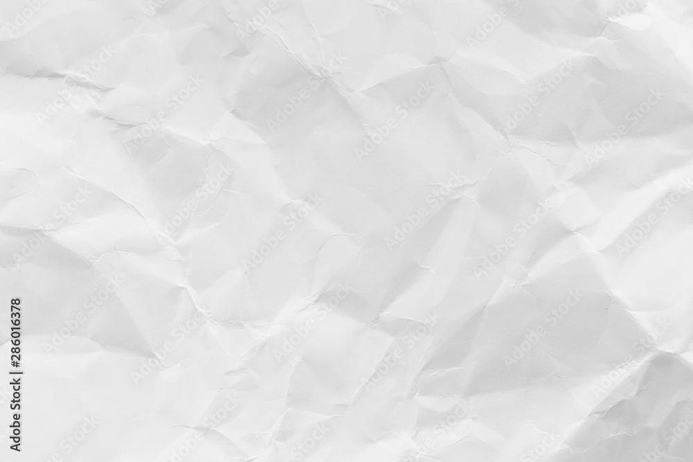 White crumpled recycled paper texture background for business communication and education design. White crumpled recycled paper texture background for business communication and education design.
