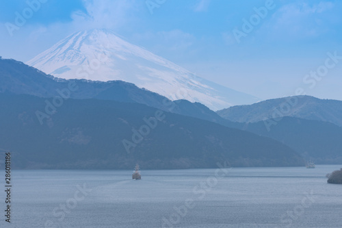 A cruise sailing in Ashinoko lake with snow cap Fuji mountain (Fujisan) , Hagone,Kanasawa photo