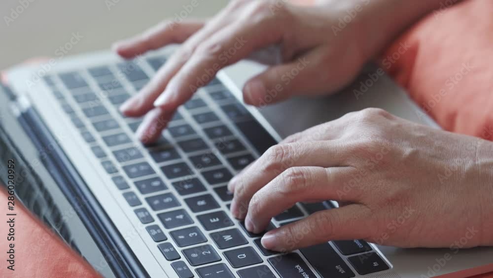 Hand typing on laptop keyboard. close up shot. Hand typing on laptop keyboard. close up shot.