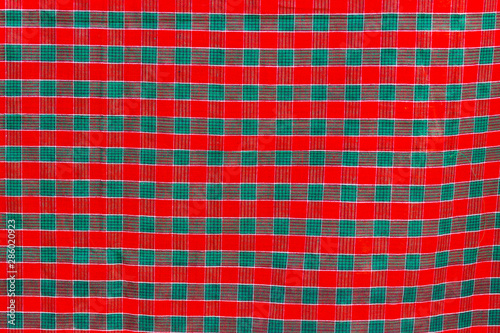 Green and red strip cotton Gamcha(Bath towel) Fabrics Close-up. photo