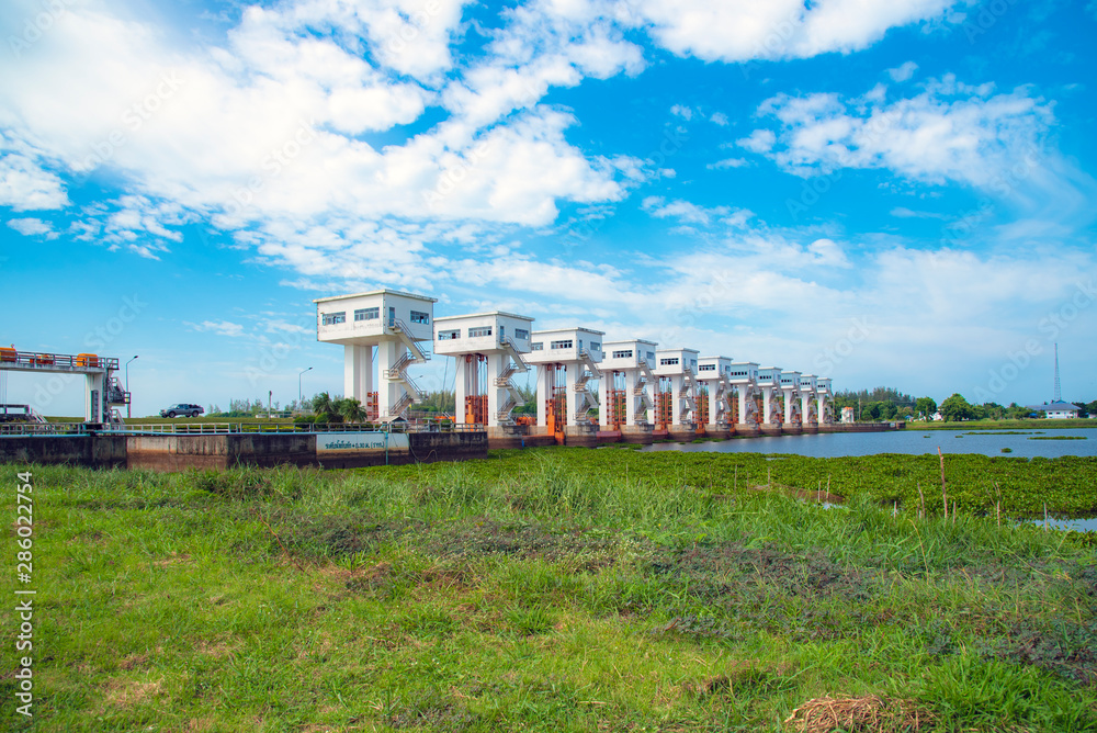 Floodgate with a beautiful sky background Floodgate with a beautiful sky background