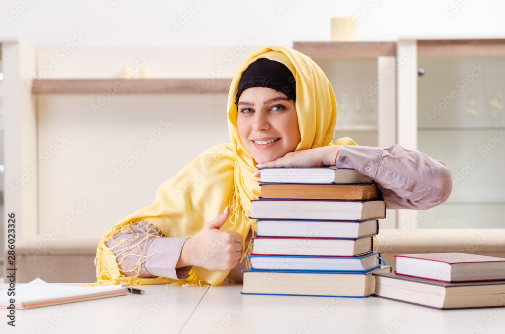 Female student in hijab preparing for exams Female student in hijab preparing for exams