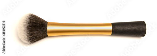 beautiful black and gold makeup brush on a white background