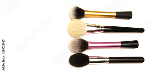 a set of brushes for makeup in different colors