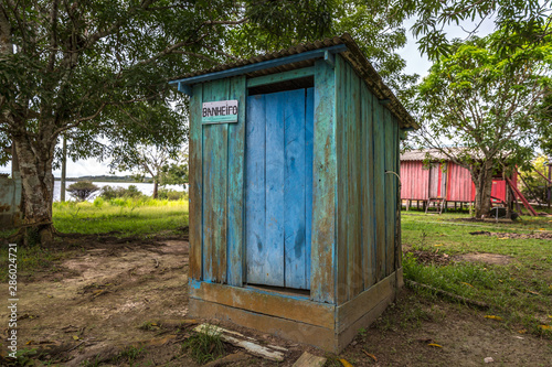 A bathroom (banheiro in portugues) with no proper sanitation in a small village in the middle of the amazon forest in Brazil