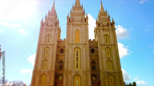 An amazing hyper lapse floating across temple square up to the front of the Salt Lake temple center for the church of Jesus Christ of Latter-day Saints or Mormons. photo