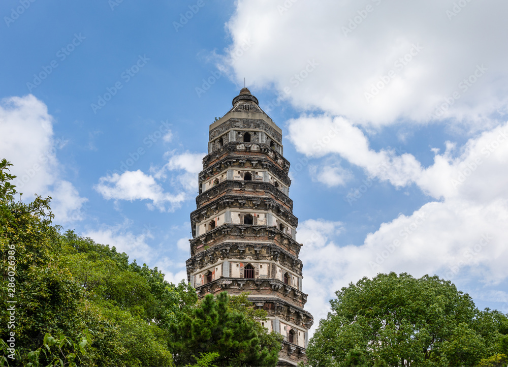 Huqiu Tower or Tiger Hill Pagoda, situated on Tiger Hill, Suzhou, Jiangsu, also known as the Leaning Tower of China.