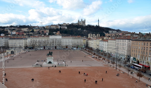 Aerial view on Lyon city and the bigest square in Europe Bellecour Square as well as on Basilica of Notre-Dame de Fourvière. City center view. photo