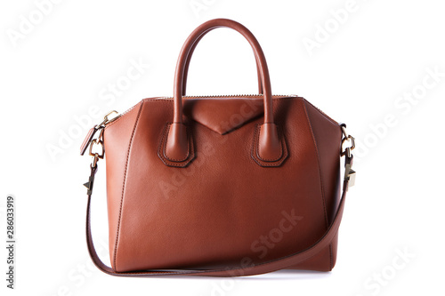 Brown color luxury fashion bag on background photo