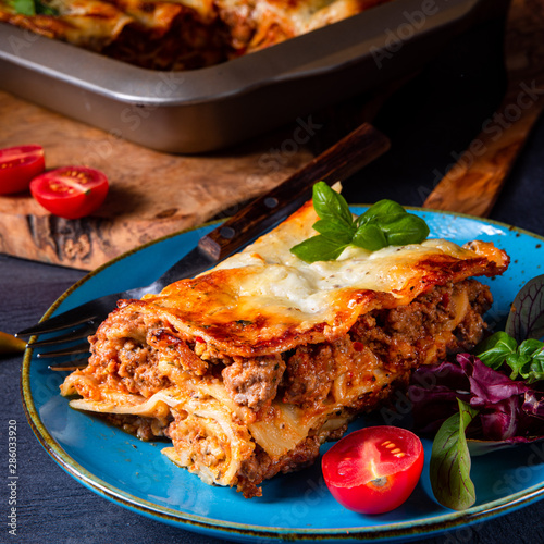 spicy lasagne with tomato sauce and basil
