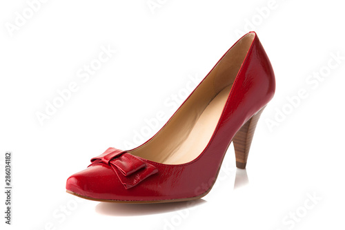 Red high heel fashion shoe on background