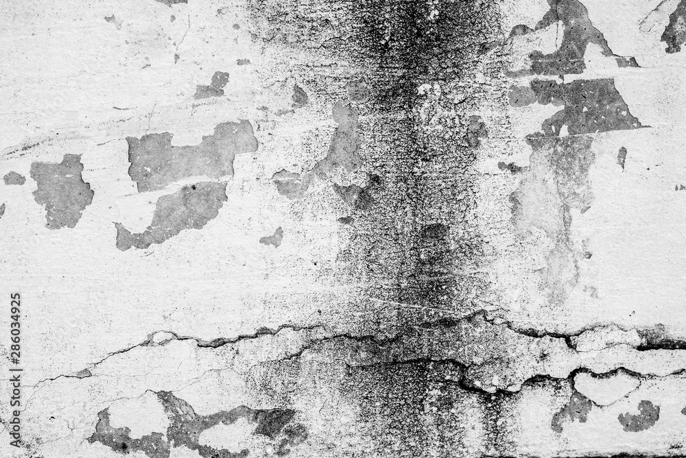 Obraz premium Texture of a concrete wall with cracks and scratches which can be used as a background