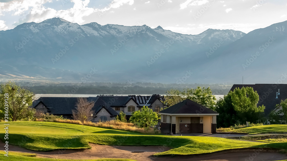 Panorama frame Golf course and residential area overlooking the lake mountain and valley