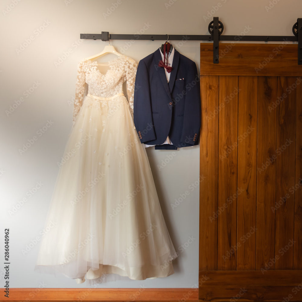 bride and groom dress on wedding ceremony day
