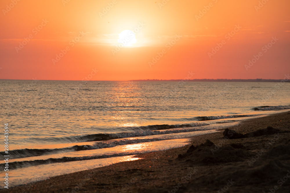 Summer sea at sunset. seascape background. summer evening landscape. sea waves. summer sunset. black sea
