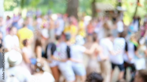 Wallpaper Mural Summer party outdoors. Blurred background with dancing people in colorful clothes in forest, park, outdoors. Unrecognizable faces. Torontodigital.ca