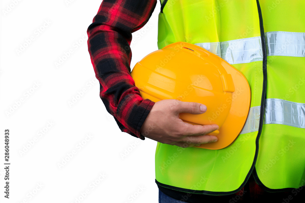 Close up engineering man standing with white safety helmet Isolated on white background,Engineer holding yellow helmet,Construction site concept Close up engineering man standing with white safety helmet Isolated on white background,Engineer holding yellow helmet,Construction site concept