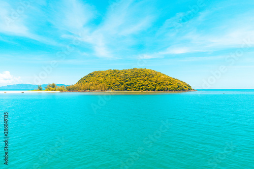 Fototapeta Naklejka Na Ścianę i Meble -  Looking at the Island, blue water and sky.