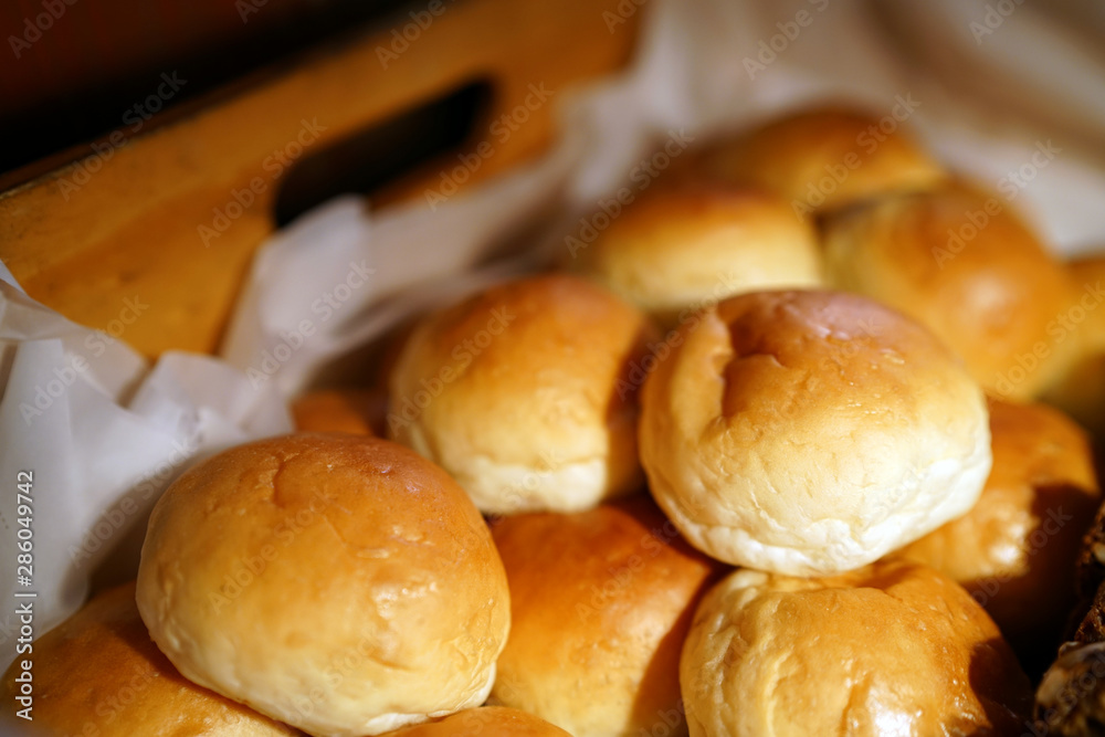 Homemade white round dinner roll bread (buns) in basket, Great appetizer and easy delicious recipe. Homemade white round dinner roll bread (buns) in basket, Great appetizer and easy delicious recipe.
