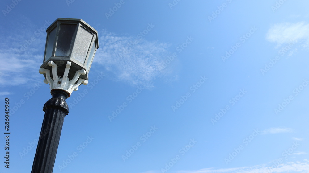 street lamp on blue sky background