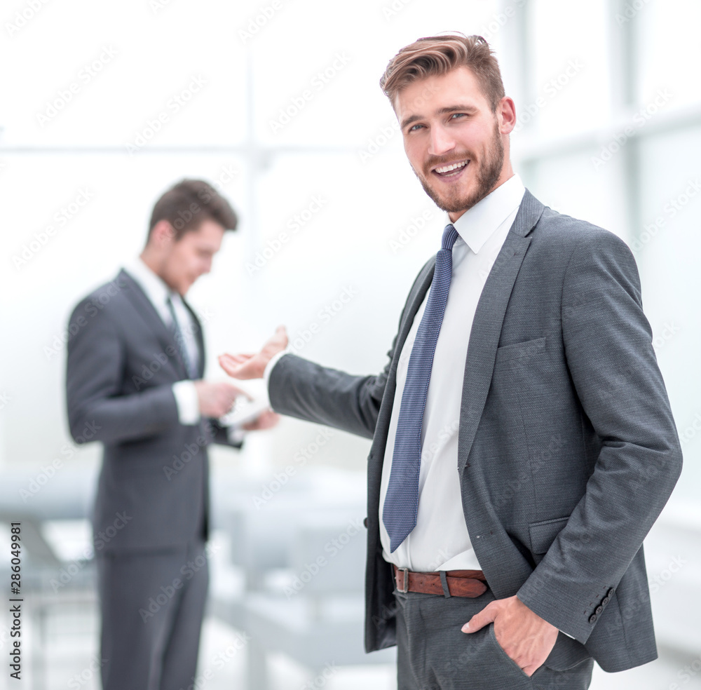 successful businessman invites you to the office. successful businessman invites you to the office.
