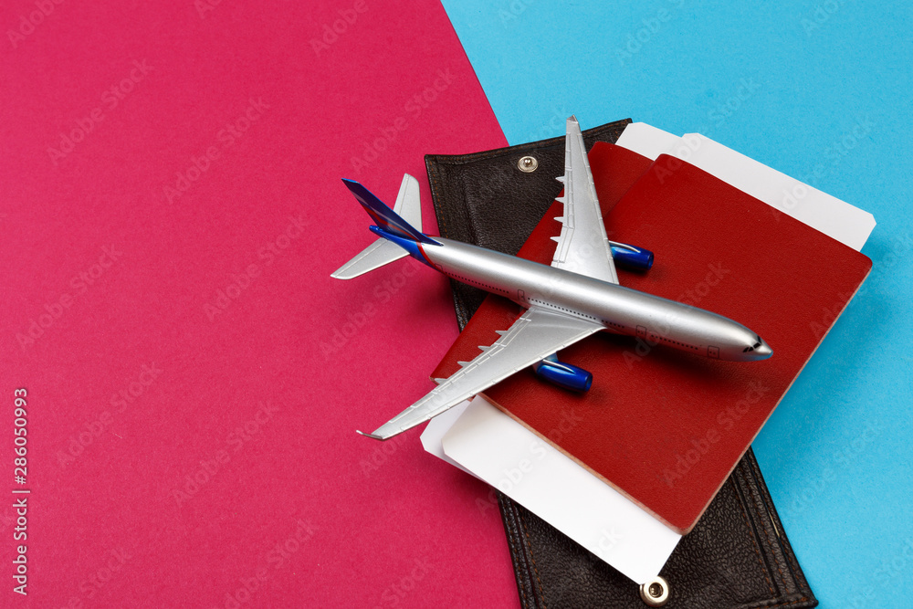 top view photo of toy airplane over color background . travel concept . top view photo of toy airplane over color background . travel concept .