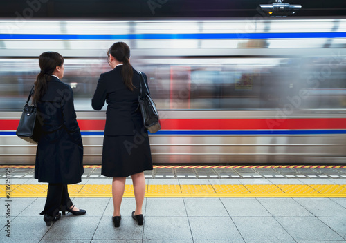 Photography Business women waiting subway train Japan transportation city lifestyle
