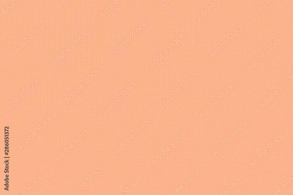 The texture of Karimat, an orange yoga mat. Can be used as wallpaper, background, texture. The texture of Karimat, an orange yoga mat. Can be used as wallpaper, background, texture.
