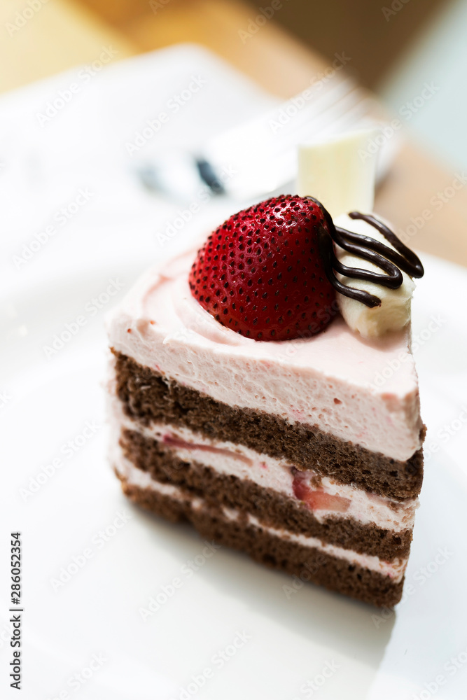 Delicious Strawberry shot cake on plate Delicious Strawberry shot cake on plate
