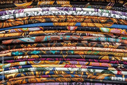 Tableau sur toile Assortment of colorful sarongs for sale in local market, Island Bali, Ubud, Indonesia