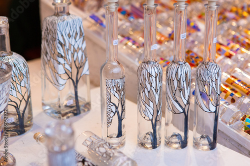 Photography Christmas souvenirs on the counter in Europe, Painted glass Christmas balls with fairy tales