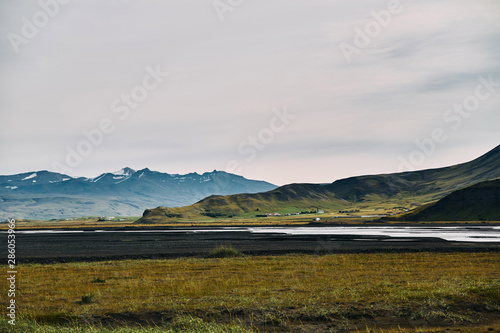 The famous glacier in the Valley with a river in Iceland. photo