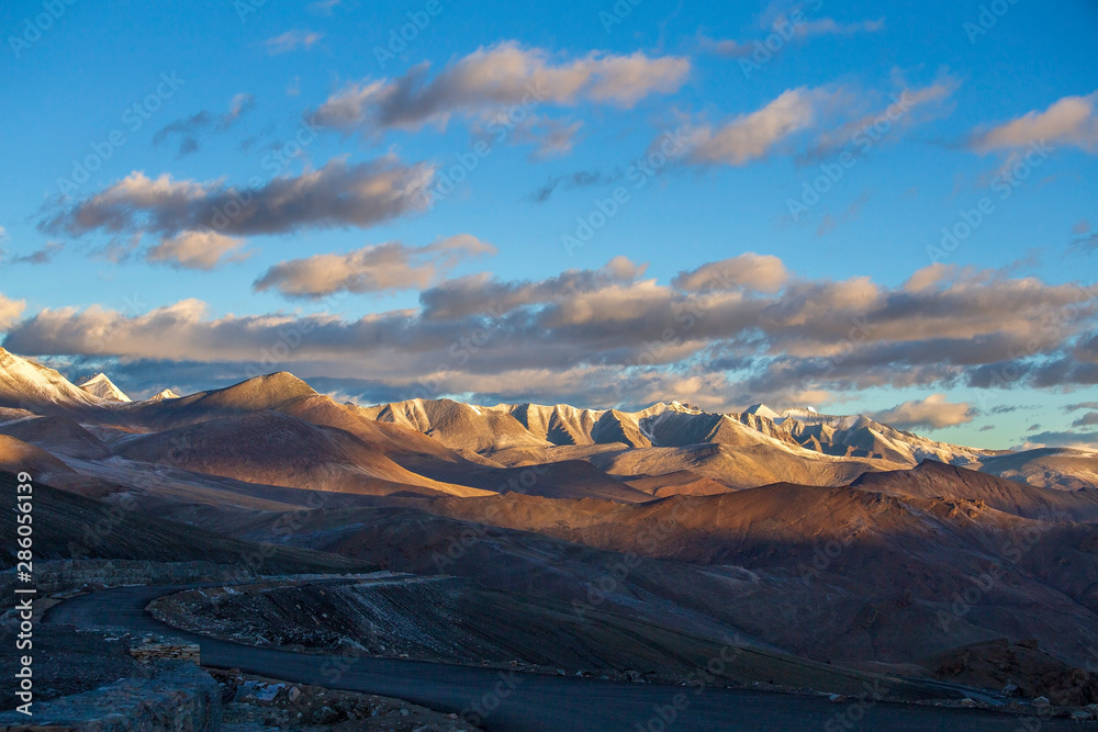 Himalayan mountain landscape along Leh to Manali highway during sunrise. Rocky mountains in Indian Himalayas, India