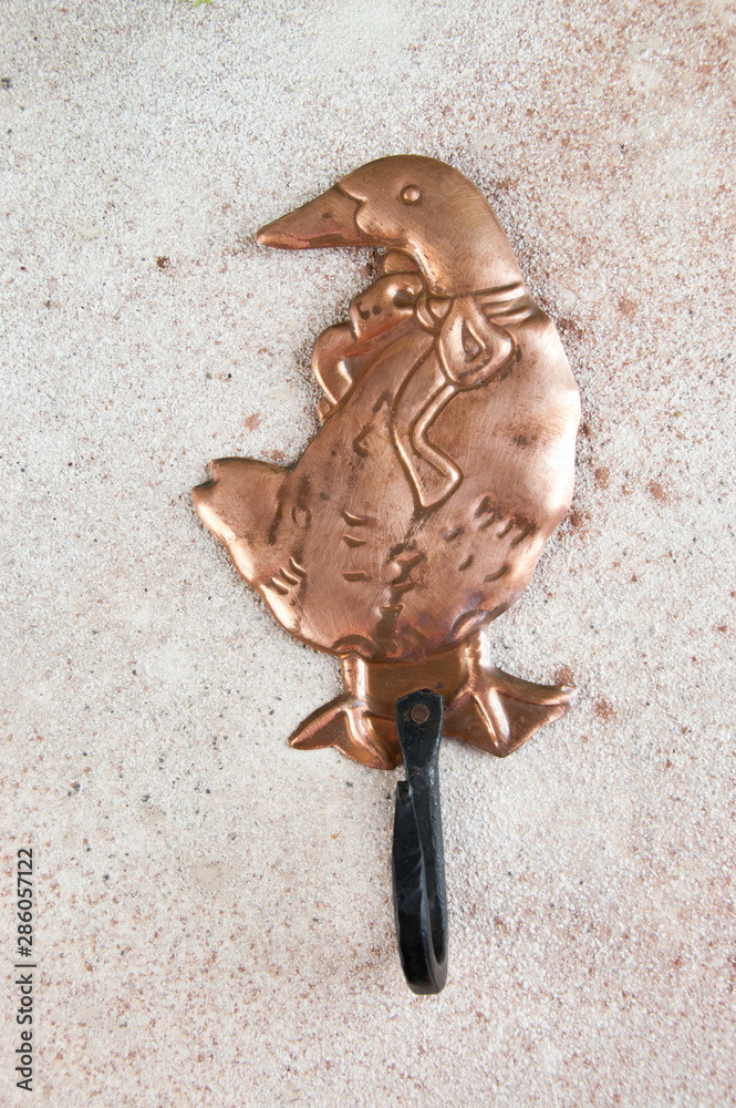 Obraz premium Ancient copper hanger hook