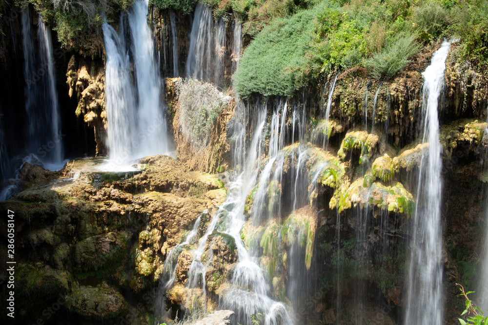 beautiful waterfall photo background, rocky field