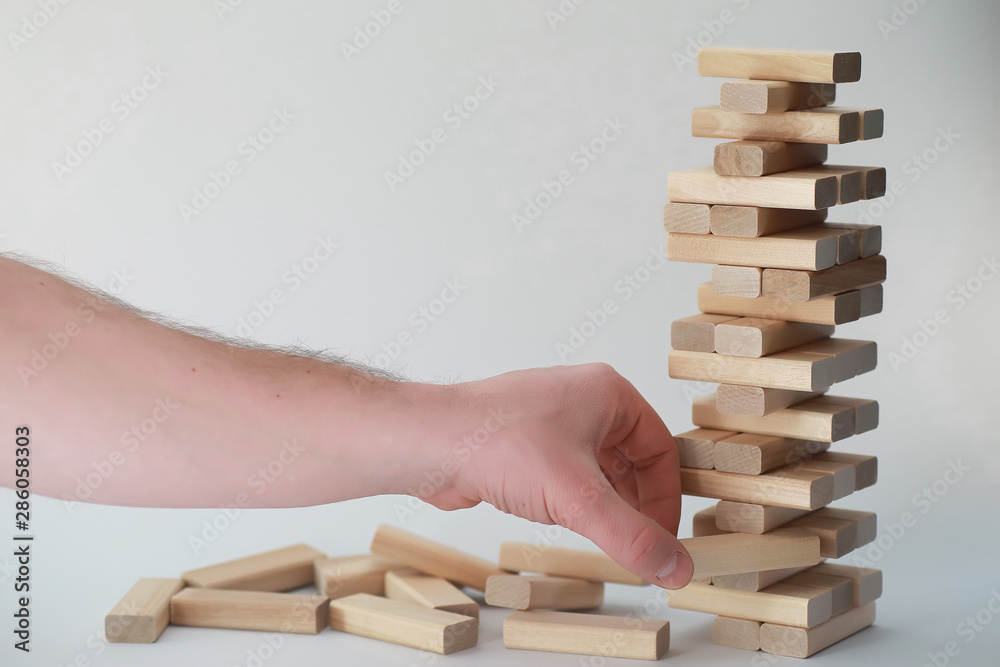 Board game jenga tower of wood sticks Board game jenga tower of wood sticks