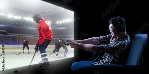Young man playing ice hockey game