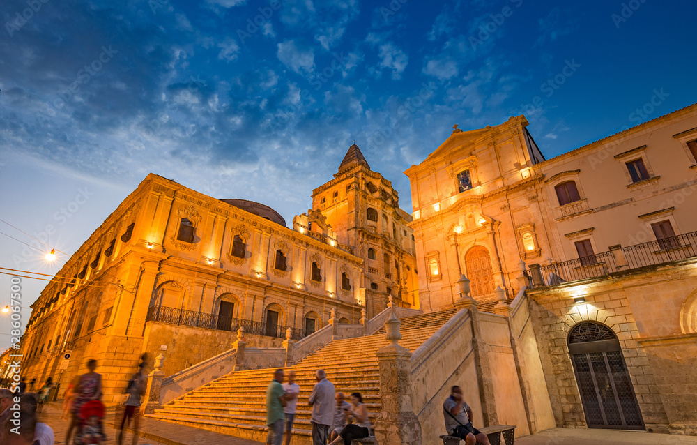 baroque church of S. Francesco d'Assisi and monastery of S. Salvatore at sunset, in Noto in Sicily, Italy.