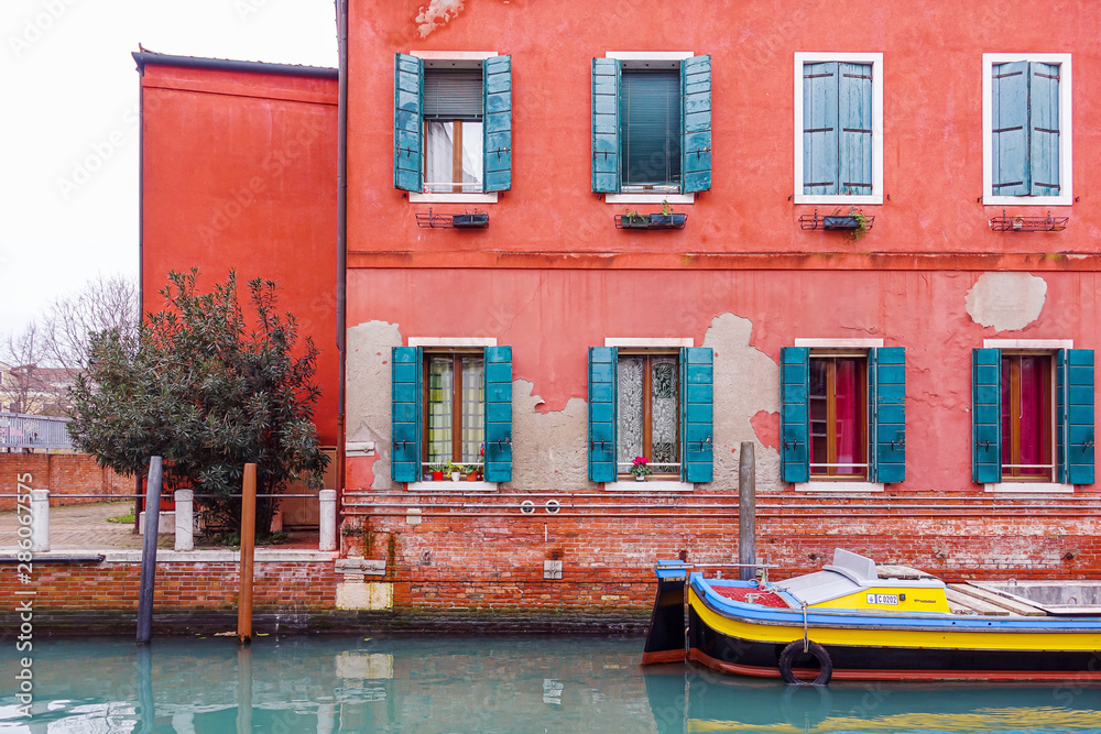 VENICE, ITALY - December 21, 2017 : street view of old buildings in Venice, ITALY VENICE, ITALY - December 21, 2017 : street view of old buildings in Venice, ITALY