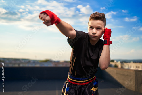 Young fighter training on the roof © Xalanx