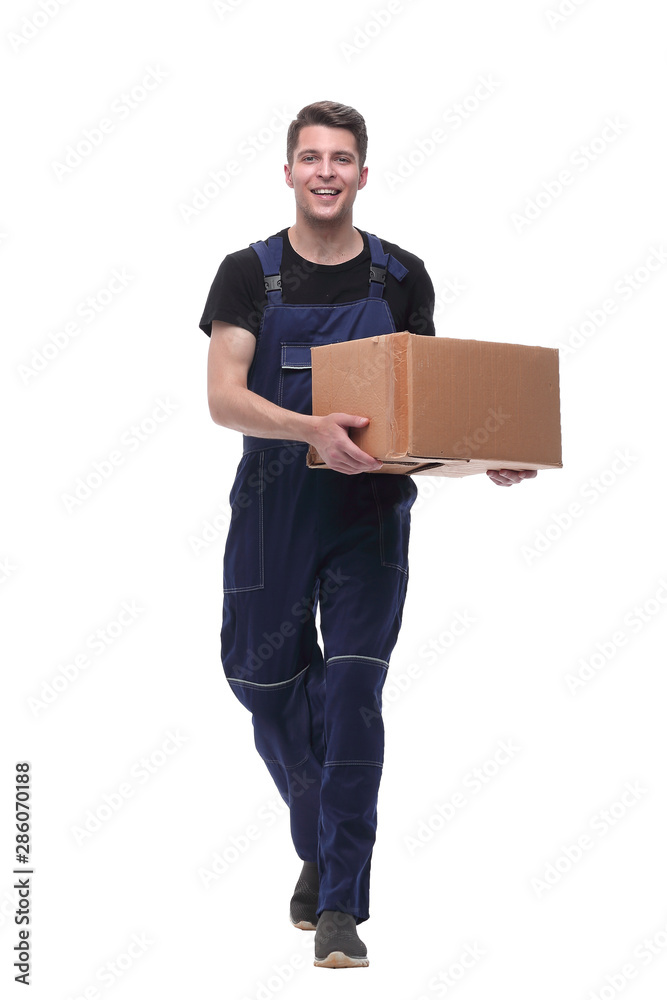 friendly worker with cardboard box stepping forward. isolated on white friendly worker with cardboard box stepping forward. isolated on white