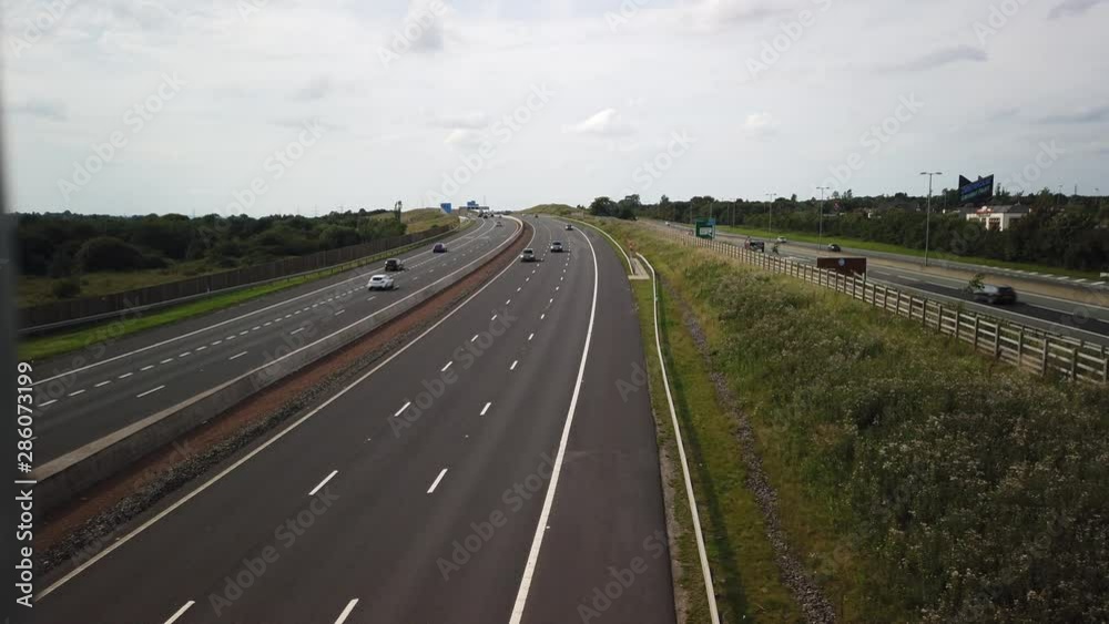 Traffic on the M8 motorway near the Showcase Leisure Park at Coatbridge. Filmed from a pedestrian footbridge. Traffic on the M8 motorway near the Showcase Leisure Park at Coatbridge. Filmed from a pedestrian footbridge.