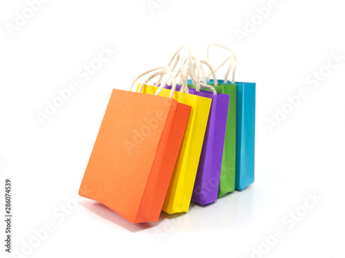 Colorful paper shopping bag isolated on white background.
