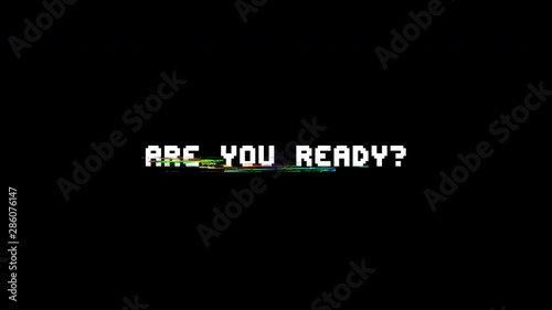 The words Are you ready?, appearing with digital noise and glitches. Nin 8-bit style.