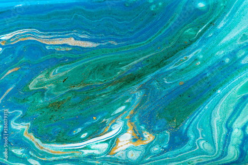 Beautiful unique turquoise acrylic marble background.